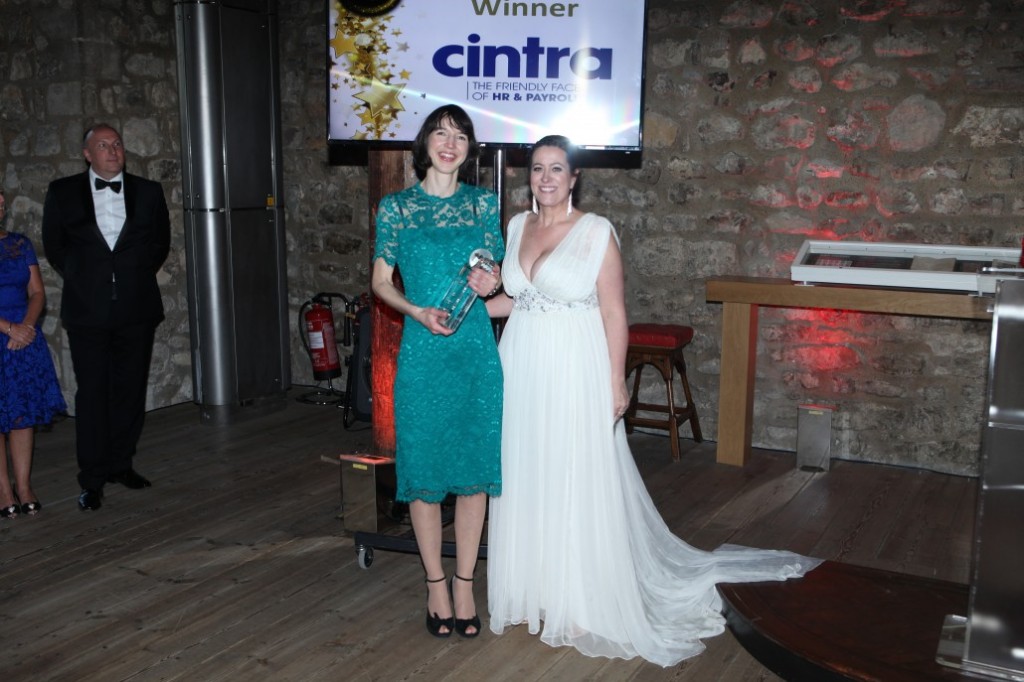 Jess McEvoy, Product Manager, Cintra HR & Payroll Services collecting the Global Payroll Award